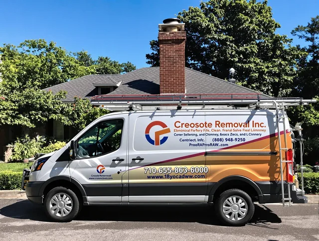 Danbury Chimney Sweep technician removing creosote safely in Danbury, CT